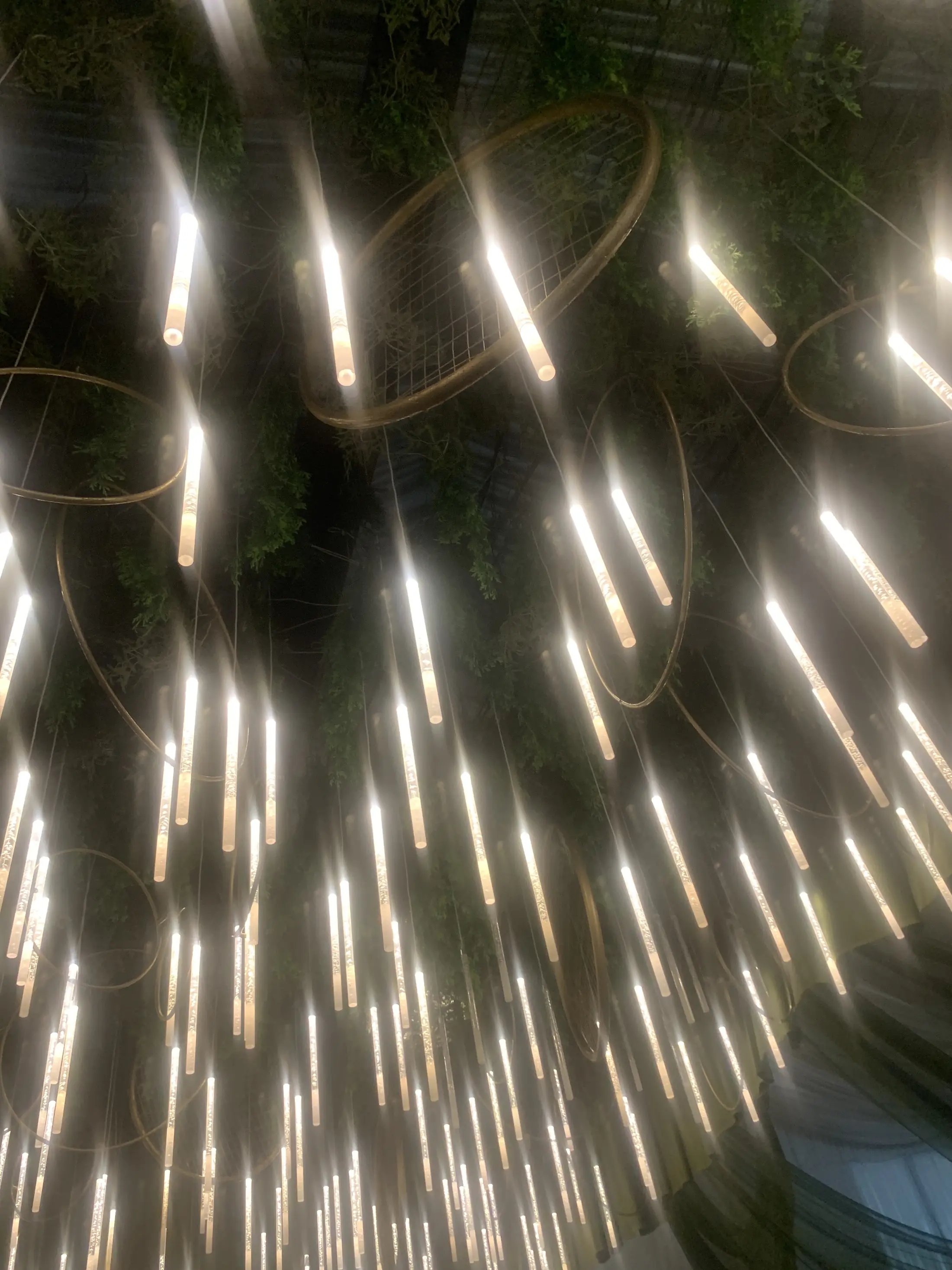 Hundreds of hanging lights falling like rain from the ceiling