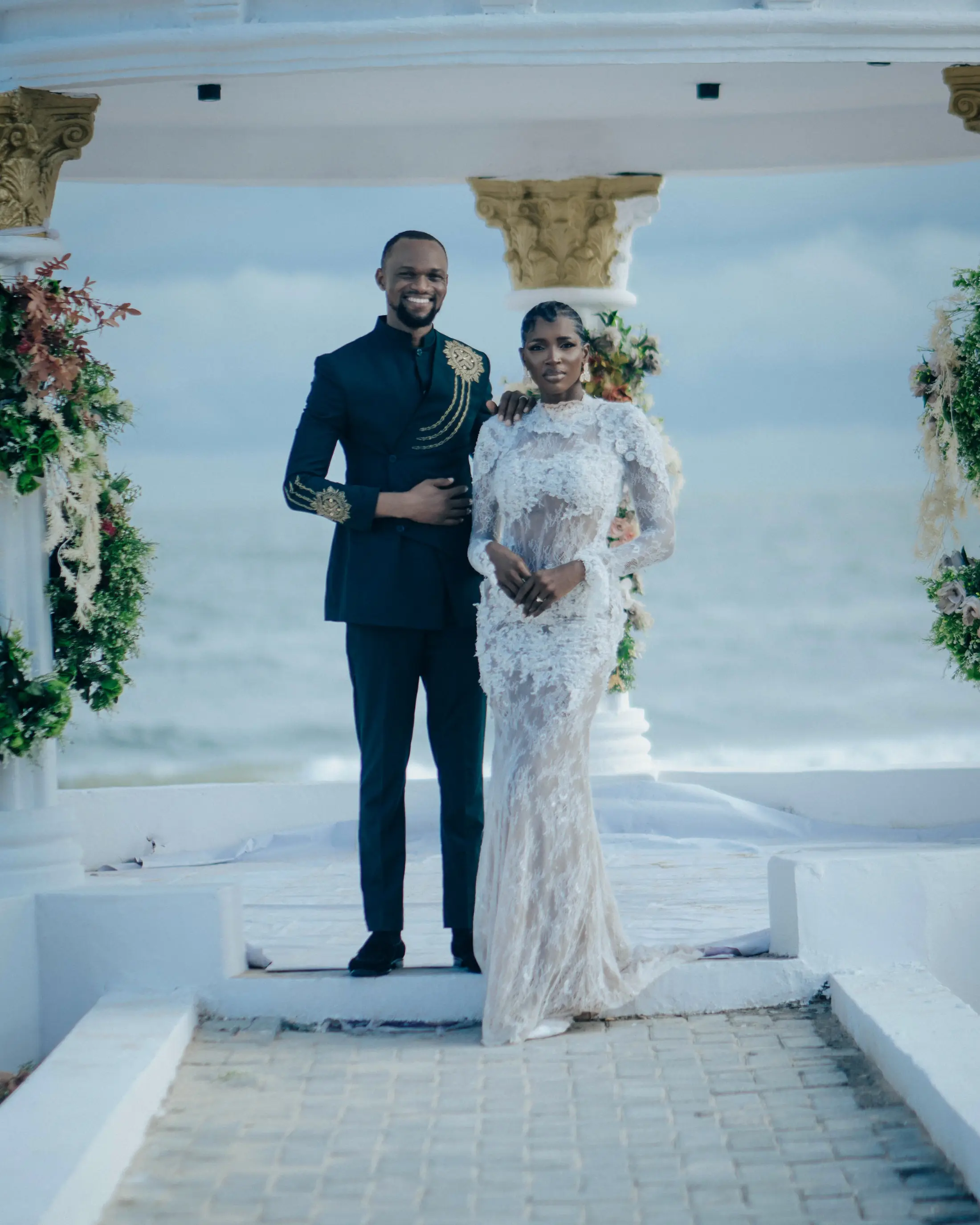Bride and groom at the dressed gazebo