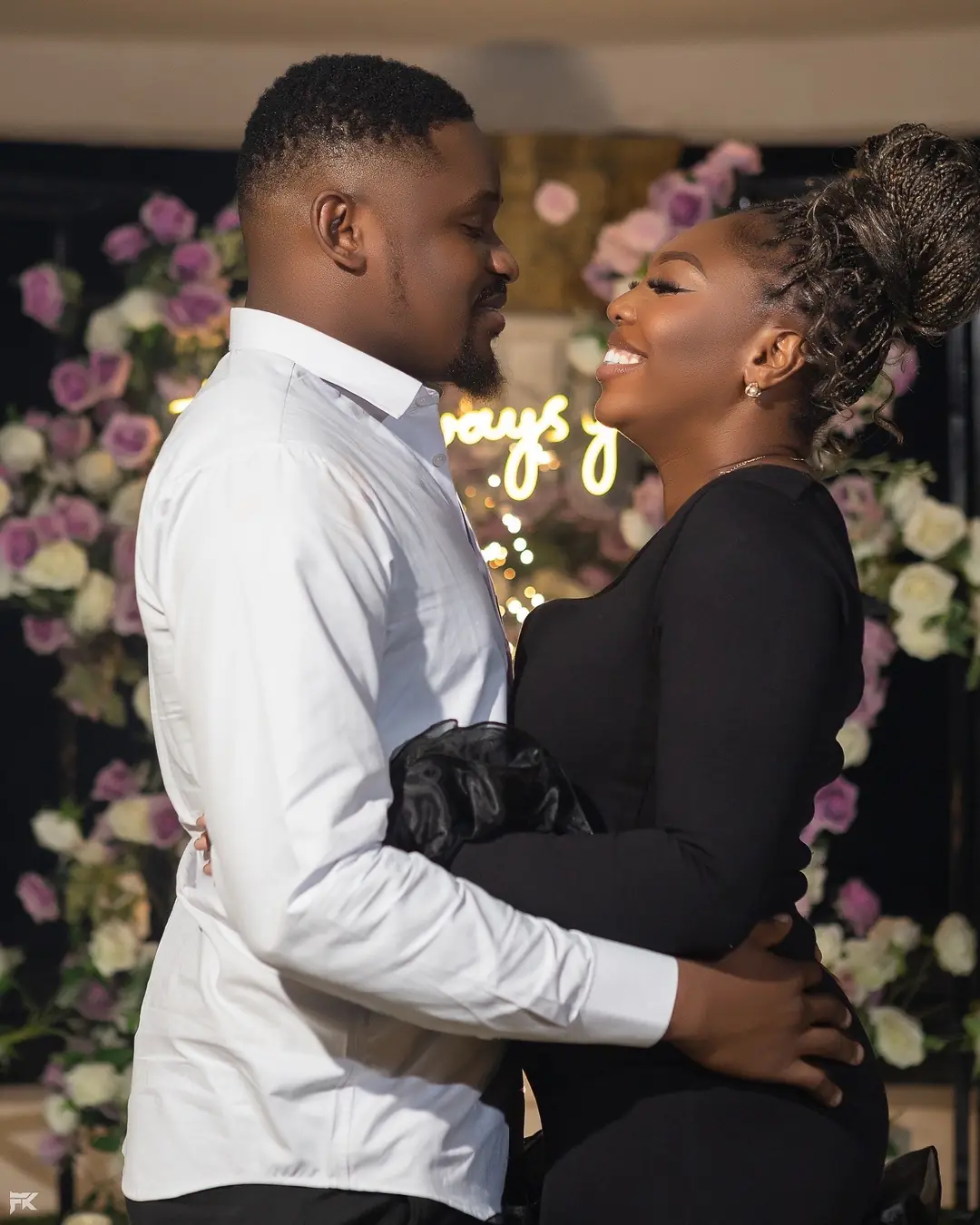 A couple holding each other after the proposal