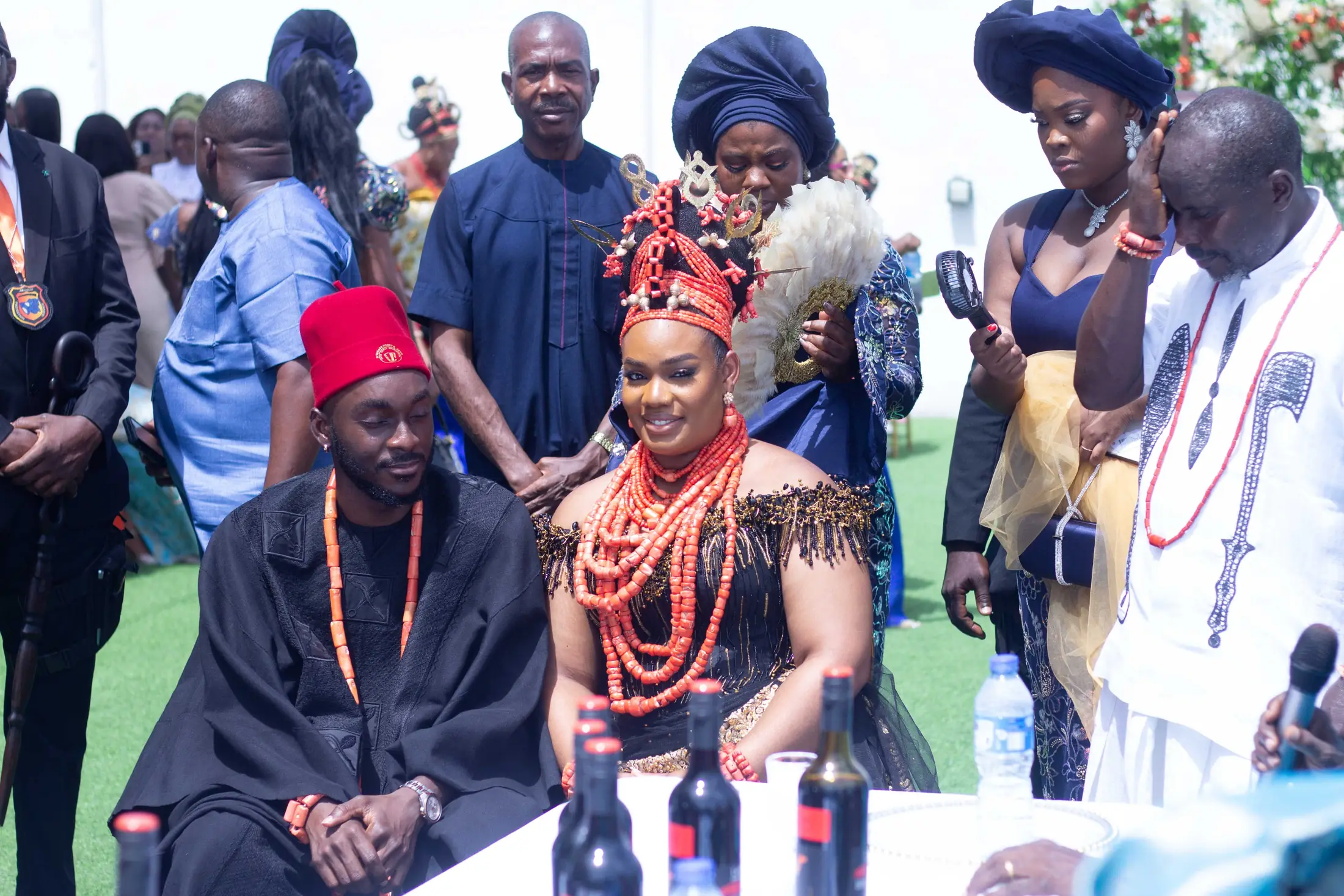 Guests in traditional dress seated for the ceremony