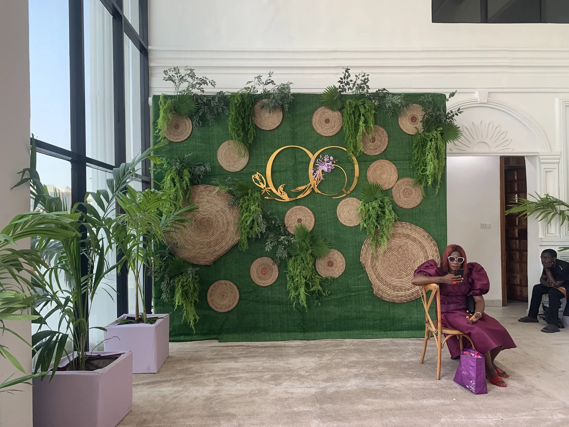 A living green wall dressed for a wedding